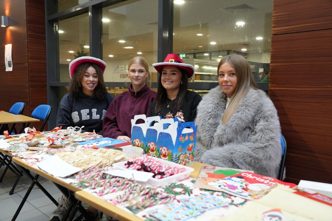Level 3 Extended Diploma for Children's Care, Learning and Development students Rhianna Addai (19, Lisburn), Francesca Baxter (19, Dromore), Eden Watson (18, Lisburn) and Amy Vallely (17, Lisburn) hosted a sweetie treat stall at the annual Christmas Market in SERC’s Lisburn Campus.